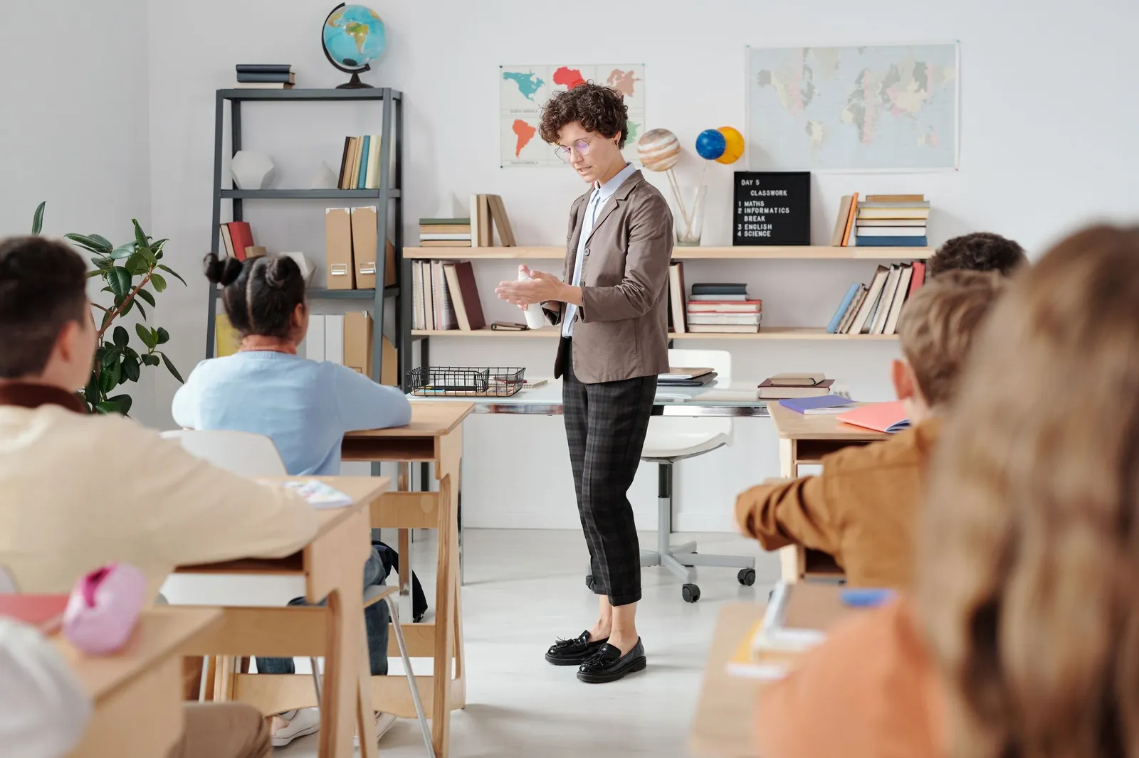 A teacher leading a lesson in front of a class